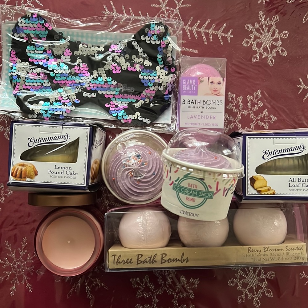 A bundle of bath bombs, three scented candles and a sleep mask. Never been used